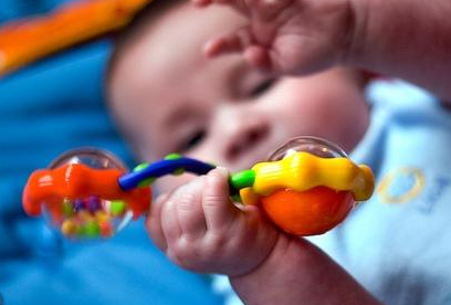  with rattles begins the process of learning the baby