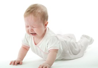 baby banging his head on the floor