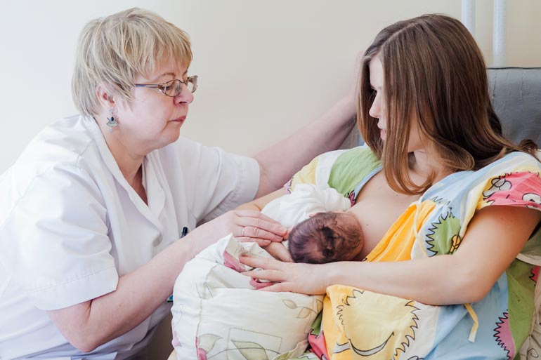gv consultant teaches breastfeeding